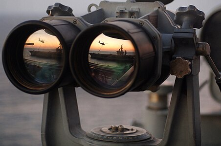 Binoculars on the signal bridge of the USS Harry S. Truman