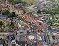 Vue aérienne de Ronse - Renaix, au premier plan le Grand-place et l'Eglise Saint Hermès à l'arrière plan à gauche