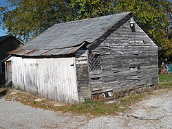 Garage with a tin roof