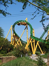 One of the Cheetah Hunt trains is seen inverted travelling through the heartline roll before entering the second half of the layout.