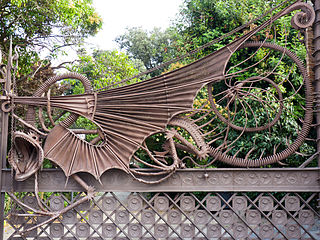 Entrance gate of Güell Pavilions in Barcelona by Antoni Gaudí (1883–87)