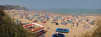 Beach crowd along Joss Bay seashore, in Broadstairs during July.