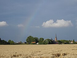 View of Ossenisse with a faint rainbow