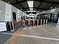 Station concourse, Myki readers and entrance, October 2024