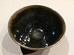 Jian bowl (tenmoku) of the "hare-fur" type from China, Song dynasty (11th century). Tokyo National Museum.