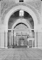Interior view of the mosque showing the mihrab, indicating the qiblah