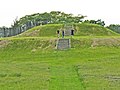 Image 30The largest platform mound at Aztalan, with modern reconstructions of steps and stockade (from History of Wisconsin)