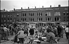 The public watches repaired windows, 1972