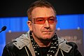 Bono, himself with U2, "Trash of the Titans"