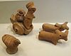 Miniature votive images or toy models from Harappa, ca. 2500. Hand-modeled terra-cotta figurines with polychromy
