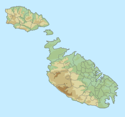 The map of the Maltese archipelago, with a red dot towards the northern coast of the island of Gozo showing the location of Qbajjar Bay.