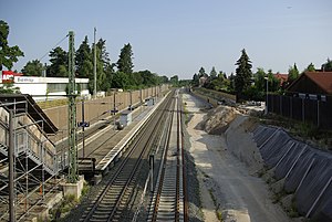 Island platform with tracks and a passing track