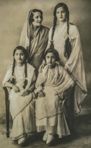 Devi with her three daughters[7]