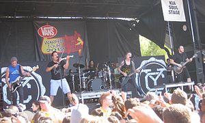 Yellowcard performing on Warped Tour 2012 (L-R: Josh Portman, Sean Mackin, Longinieu Parsons III, Ryan Key and Ryan Mendez)