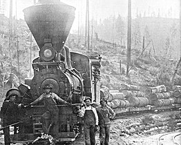No. 5 and a load of pine logs in 1918.
