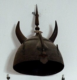 Indo-Persian Devil Mask, cuirass and scimitar.