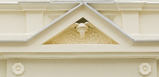 Adorned pediment