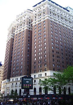 Herald Towers (formerly the Hotel McAlpin) as seen in 2011, looking northeast from the corner of Sixth Avenue and 32nd Street. The facade is made of brick and terracotta.