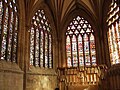 The Lady Chapel, probably by Thomas Witney, (1310–19). The windows have tracery of a regular net-like pattern and contain ancient stained glass.