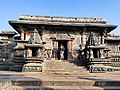 Small Bhumija-style shrines flanking the step before the main Belur temple, Karnakata
