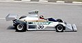 In its first years, Fittipaldi raced with a silver livery with Brazil's national colors, this is Emerson 'Emmo' Fittipaldi driving his FD04