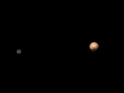 按照实际比例拍摄的冥王星和卡戎，新视野号拍摄。