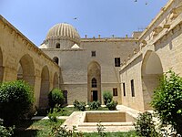 View of the main interior courtyard, looking west towards the mausoleum section