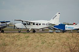 Photograph of the aircraft involved, showing its former registration VH-EZS