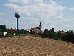 Water tower and the Church of Saints Simon and Jude