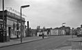 On the right, Lillie Bridge obscured by advertising hoardings in 1963