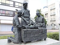 Bronze statue in front of the Almeida Memorial Hospital in Ōita