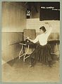 C. 1915: fencer Sibyl Marston holding a foil