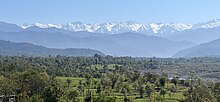 A panoramic vista capturing the majestic Pir Panjal mountain range (Lower Himalayas) as seen from Tatrinote, AJK.