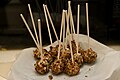 Bacon and pecan covered cheese-balls-on-a-stick