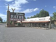 The Buckhorn Baths Motel was built in 1939 and is located at 5900 Main St. in Mesa. The Buckhorn Baths Motel is a complex consisting of fourteen buildings including a bathhouse, a main office building, and individual room units. The motel was listed in the National Register of Historic Places on May 10, 2005, reference number #05000421.