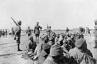 Indian troops guard Turkish prisoners captured at Sannaiyat