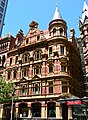 Winfield Building, Collins Street, Melbourne, also demonstrates Queen Anne traits; completed in 1891
