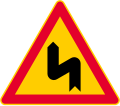 Dangerous curves, first bend to left (formerly used )