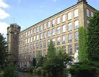 Clarence Mill, Bollington, with Macclesfield Canal in the foreground
