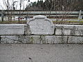 Northern side of the Kavšek Bridge. The two side panels read "Kauschegg Bridge."