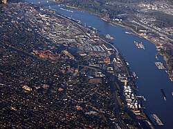 Barge traffic along the industrial riverfront, October 2006