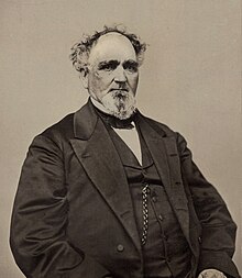 A sepia-toned photo of William Palmer Dole seated