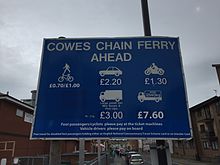 Road sign describing the various fees required to use the Cowes Chain Ferry between Cowes and East Cowes as of 25 September 2016