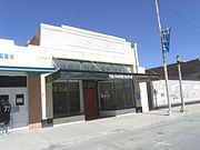 The Mauk Building was built in 1925 and is located in 360 Main St. This building was one of three built by early movie-house mogul and later U.S. Marshal, George Mauk. A portion of the Isis Theater was located on the same site. Listed as Historic by the Historic District Advisory Commission.