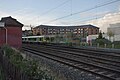 A London Midland Class 350 train speeds past Kenton on the West Coast Main Line