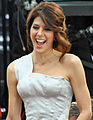 Marisa Tomei in a one-shouldered neutral gown