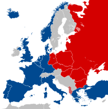 A map of Europe showing several countries on the left in blue, and ones on the right are in red. Other unaffiliated countries appear in grey.
