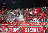 Nea Salamina Famagusta FC fans at Ammochostos Stadium in a game against Enosis Neon Paralimni FC in season 2006–07.