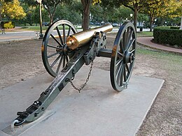 Photo shows a polished 12-pounder Napoleon gun-howitzer that is located near the Texas Capitol in Austin, Texas.
