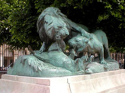Two lions disputing a boar by Auguste Caïn. Bronze, (1882)